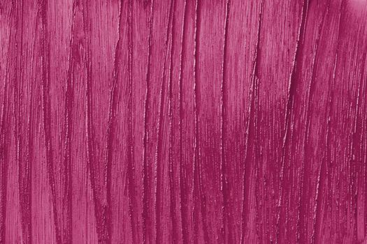 Marsala beauty product sample closeup. Purple cosmetics smear pattern background. Liquid lipstick cosmetic. Pink swatch matt backdrop. Makeup creamy texture. Creamy stroke