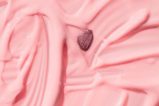 Abstract cosmetic textured background, nail polish drop on pink liquid foundation texture. Creamy skincare lotion product closeup. Moisturizing beauty creme, balm swatch, pink paint, yogurt texture