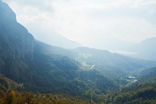 Picturesque alpine summer countryside landscape, mountain hills in Lombardy, Italy. Tourist adventure, colorful scene, rural scenery. Valsassina, Lombardy, Italy