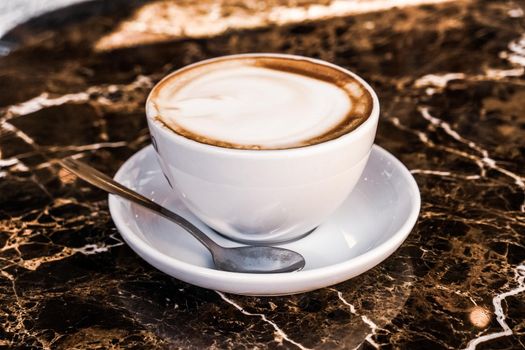 Breakfast, food and drinks and service concept - Cappuccino in a restaurant, at a coffee break