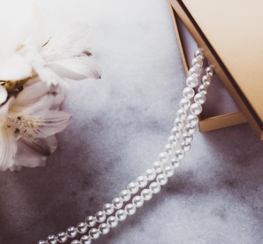 Valentine's day ideas, luxury shopping and holiday inspiration concept - Pearl jewellery in a vintage golden gift box