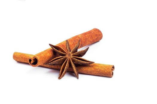 cinnamon sticks and star anise on a white background. spices superfood isolate. tubes from the bark of a tree Cinnamon. spices for mulled wine. High quality photo