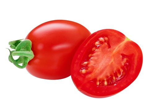 San Marzano tomatoes. Whole and cut up plum cherry juicy tomato isolated on white. Italian fresh vegetables. Organic raw vegan healthy food vegetable. Farm market product. Front view, macro, studio