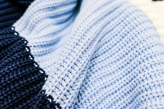 Knitwear, fabric textures and rustic lifestyle concept - Knitted winter clothes