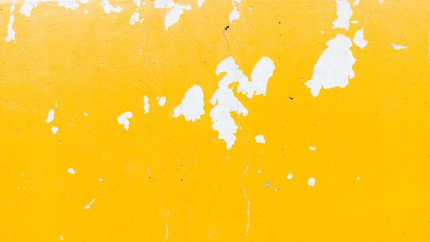 Wall yellow painted peel out texture background