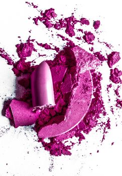 Beauty texture, cosmetic product and art of make-up concept - Crushed eyeshadows, lipstick and powder isolated on white background