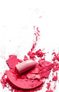 Beauty texture, cosmetic product and art of make-up concept - Crushed eyeshadows, lipstick and powder isolated on white background