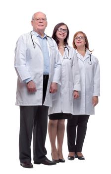 in full growth. diverse medical professionals standing together. isolated on a white