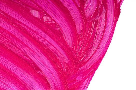 Beauty product sample closeup. Purple cosmetics smear pattern. Liquid lipstick cosmetic isolated on white. Pink swatch matt backdrop. Makeup fashionable creamy texture stroke
