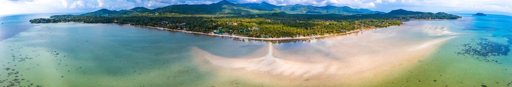 Aerial view of Hin Kong beach and its sand bank, in Koh Pha Ngan, Thailand, south east asia