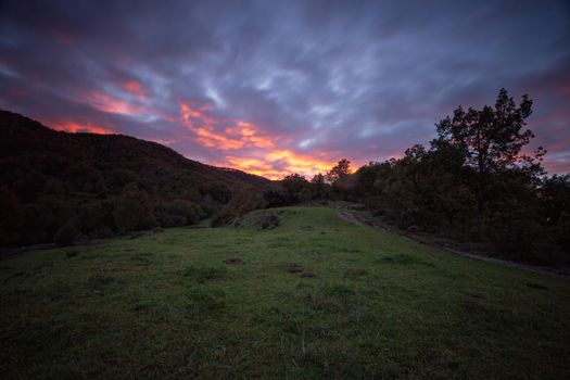 Colorful sunset light in a Spanish Montseny Mountain in autumn time