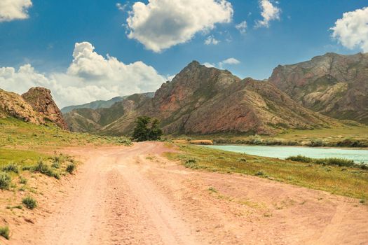 The road along the Ili River in the tract Tanbaly tas in the Almaty region of Kazakhstan.