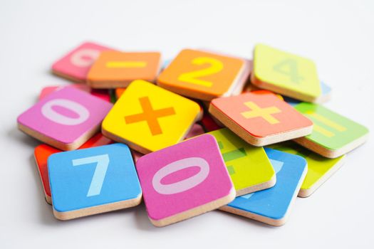 Number wood block cubes for learning Mathematic, education math concept.