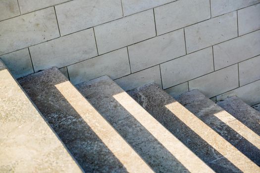 Staircase in the city, black and white pattern on the stairs on a sunny day