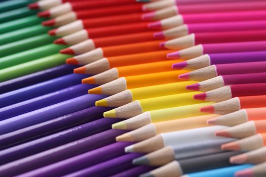 Colored pencils closeup. Collection of colored pencils in row concept