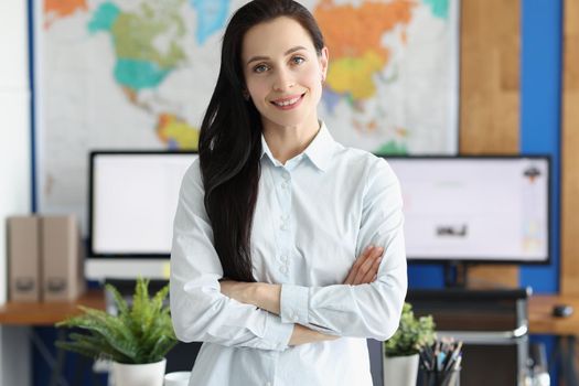 Casual business woman looks happy and smiling in office. Business consultant manager workplace