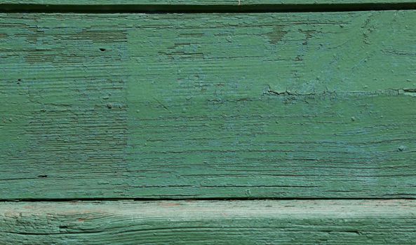 Old weathered wooden planks background. Green Wood Background.