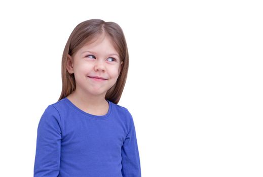 Smiling child kid isolated on white background, looking aside at something waist up caucasian little girl of 5 years in blue