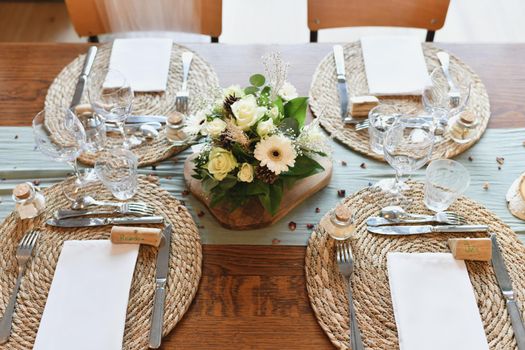 The wedding decor with a white bouquet