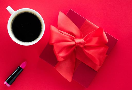 Romantic celebration, lifestyle and birthday present concept - Luxury beauty gift box and coffee on red, flatlay