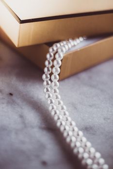 Valentine's day ideas, luxury shopping and holiday inspiration concept - Pearl jewellery in a vintage golden gift box