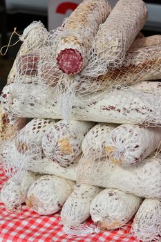 dried sausage in white packaging in the French market