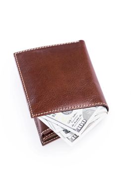 Brown wallet with money isolated on white background