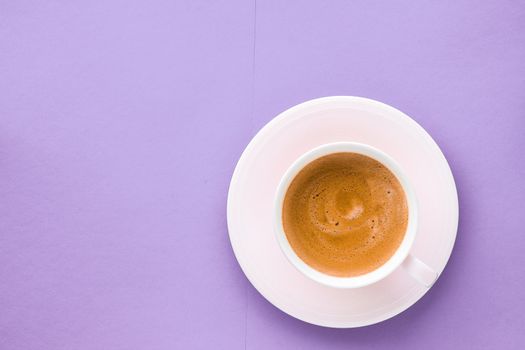 Breakfast, drinks and cafe menu concept - Coffee cup on purple background, top view flatlay