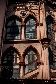 Architectural symmetrical shot of windows of an old building.