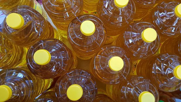 Close up top view of bottled cooking oil to be used for cooking selective focus.