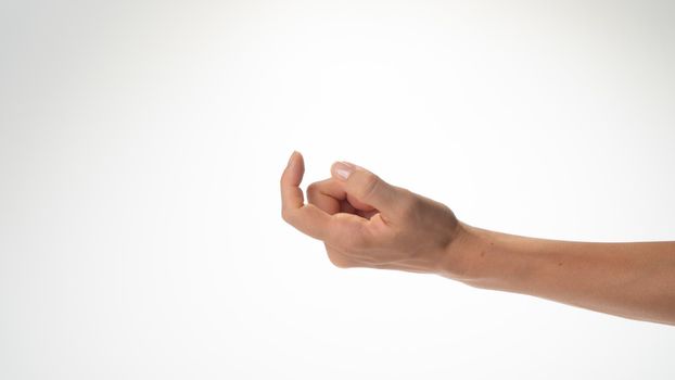 women's hand gesture to call a finger to himself like a hook. High quality photo