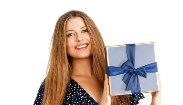 Birthday, Christmas or holiday present, happy woman holding a blue gift or luxury beauty box subscription delivery isolated on white background, portrait