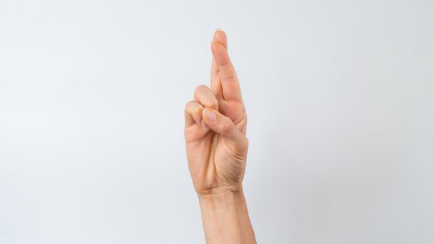 Sign language of the deaf and dumb people, English letter r. High quality photo