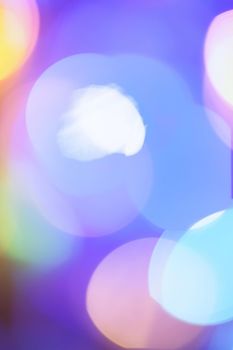 Colourful lights bokeh - abstract background, defocused overlay, bright colours concept