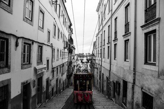 Tourist and underground trolley car in Lisbon Portugal
