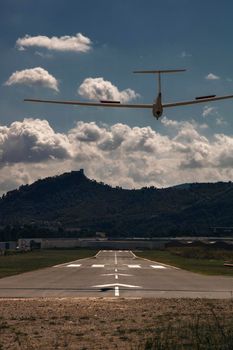 Light aircraft landing in a small aerodrome in Odena, Barcelona