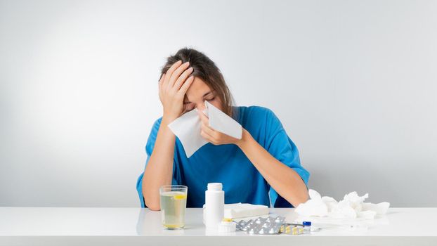 Sick woman feels bad - flu, runny nose, medication treatment. High quality photo