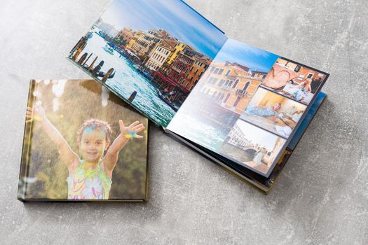Photobook Album with Travel Photo on Table.