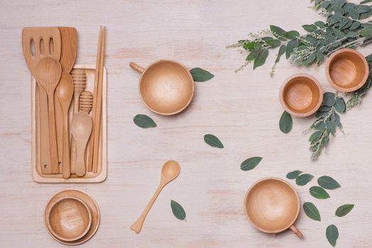 Wooden kitchen utensils on table