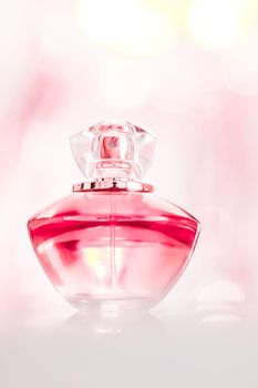 Perfume bottle on glamour background, floral feminine scent, fragrance and eau de parfum as luxury holiday gift, cosmetic and beauty brand present concept