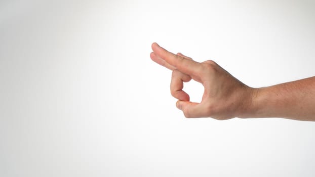 Male hand gesture slitban on white background. High quality photo