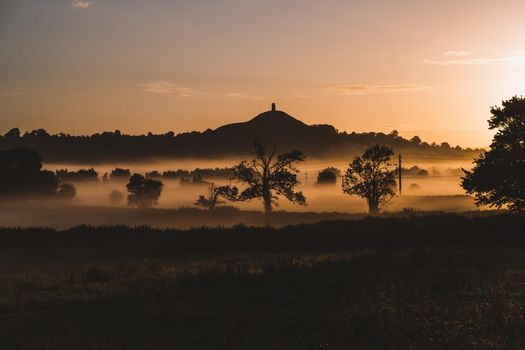 Glastonbury Tor on sunrise, United Kingdom. High quality photo