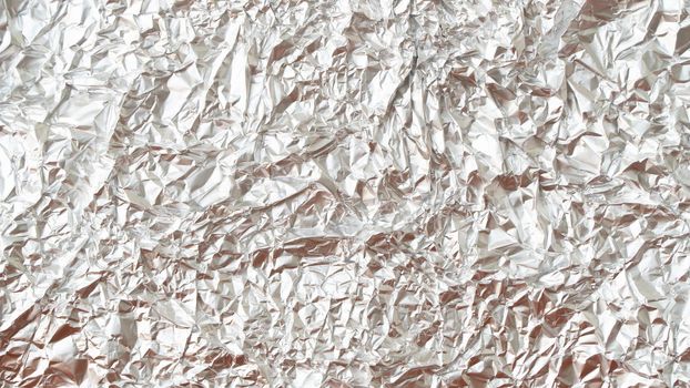 Rumpled foil texture background silver. High quality photo