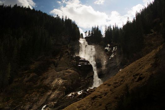 Beautiful landscape showing Krimmler waterfall in the forest in a mountain in Austria
