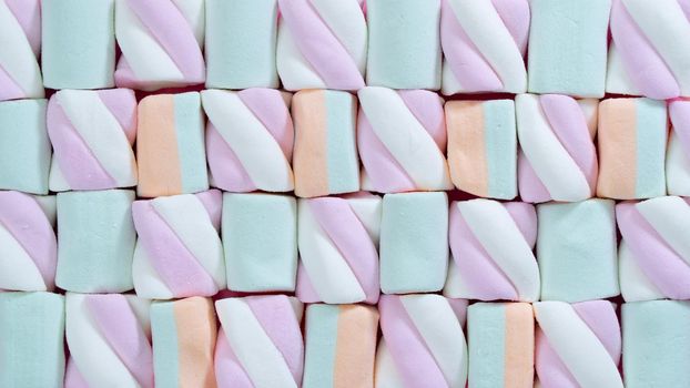 Background of marshmallows of delicate shades, sweetness. High quality photo