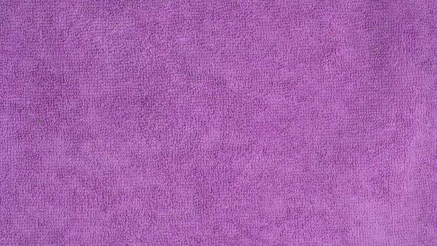 Purple Microfiber Texture Fabric Pile Background. High quality photo