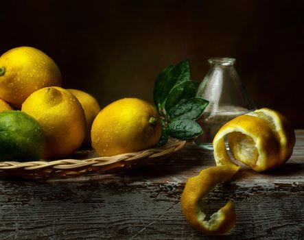 still life of berries and fruits on the table on a dark background photo