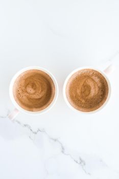 Breakfast, drinks and modern lifestyle concept - Hot aromatic coffee on marble, flatlay