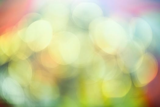 Colourful lights bokeh - abstract background, defocused overlay, bright colours concept