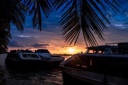 Bangkok Thailand Bangkok Smart Ferry electric passenger boat service Urban Line at pier waiting for depart at sunset